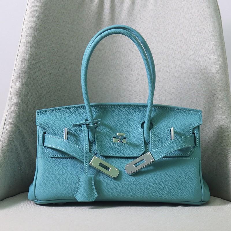 New Togo Top-layer Cowhide Horizontal Platinum Bag Large Capacity Fashion Leather Hand-to-shoulder Commuter Underarm Women's Bag