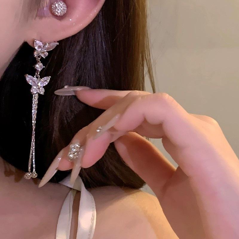 Sweet and exquisite super flash butterfly fringed earrings female, new face thin long earrings Internet celebrity earrings