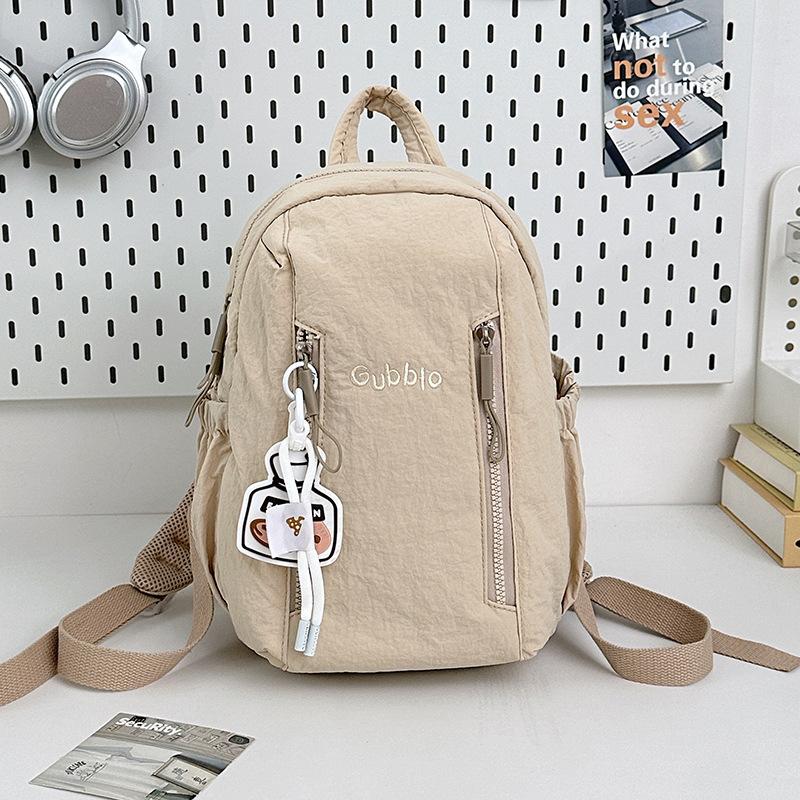 

2025 summer new mini niche backpack women s Korean version of foreign fashion simple solid color Japanese schoolbag no pendant хаки