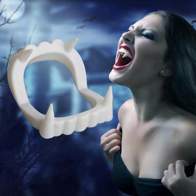 Vampiro Dracula denti aguzzi lupo mannaro zombi zanne favore festa di Halloween