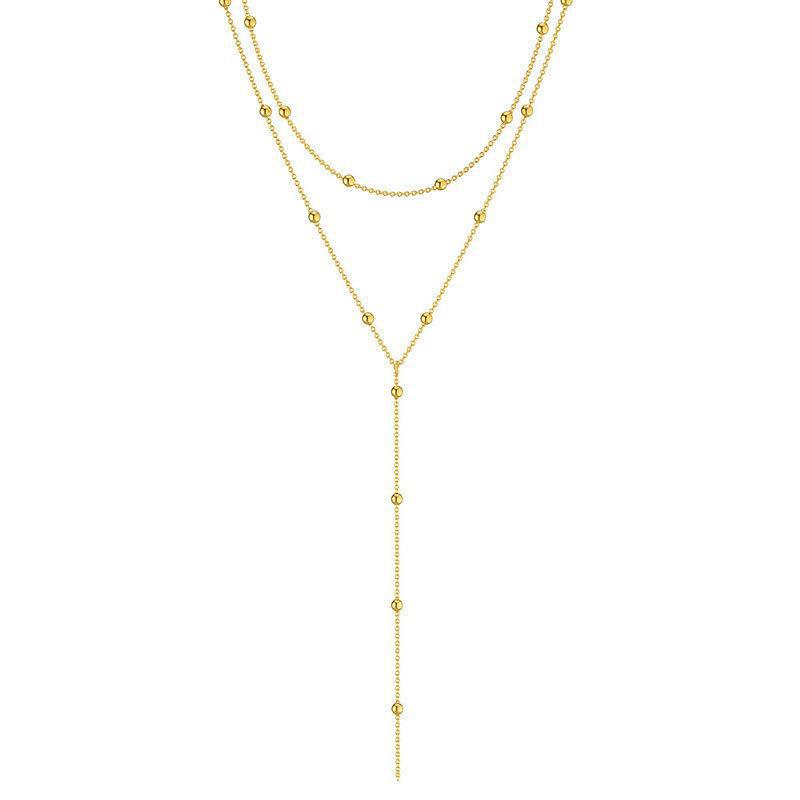 

Модне двошарове Y-подібне намисто з китицями - шикарний багатошаровий ланцюжок із круглими намистинами для модного образу.