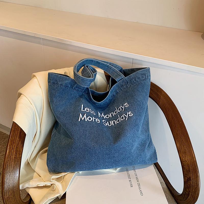 

Chic Retro Style Large Capacity Denim Tote Bag For Students And Commuters In Trendy Blue