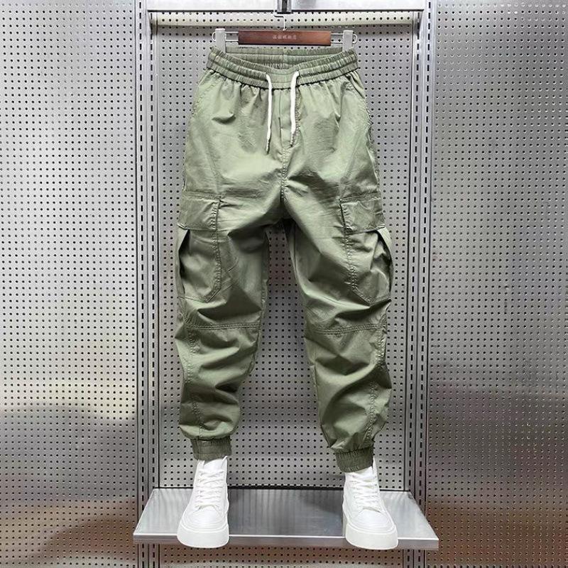 Men's Tapered Quick-Dry Elastic Cargo Pants with Drawstring, Multi-Pocket, Casual Trendy 9-Point Style for Spring and Autumn.