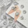 Elegant Nail Art: Pearl & Butterfly Inlaid Pigeon Egg with Zirconia and Rhinestones