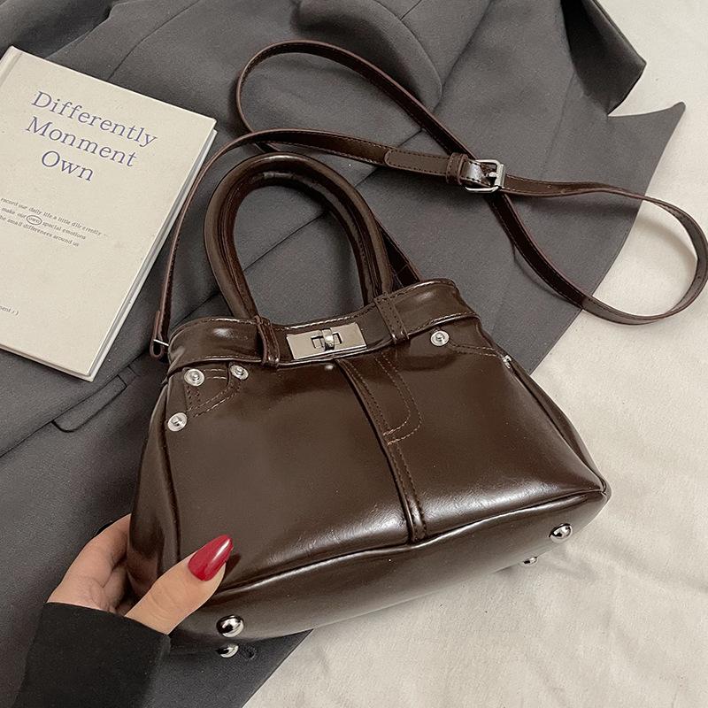 

Весна и лето новая французская мода стиль для поездок на работу портативная сумка-ведро женская универсальная высококачественная зарубежная повседневная сумка-мессенджер