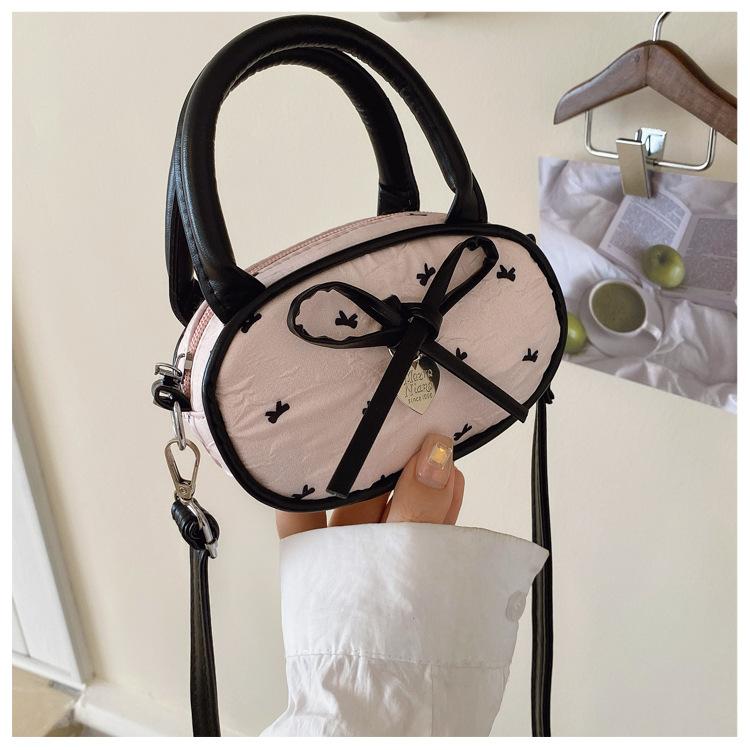 

2025 summer new Korean version niche bow bag women s shoulder messenger bag polka dot portable small square bag розовый