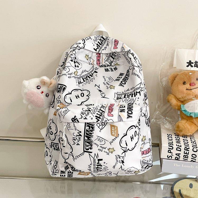 Schoolbag high-value printed graffiti schoolbag female junior high school student large-capacity backpack ins trendy brand high school student 
