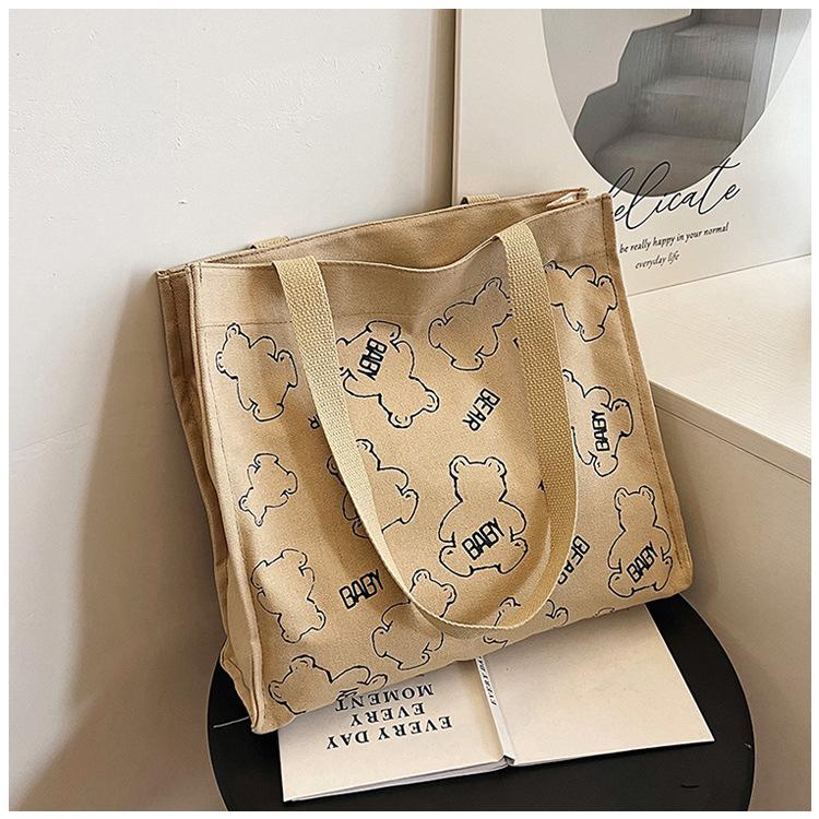 

Холщовая сумка женская сумка-портфель для студенток 2025 новая мультяшная милая на плечо сумка-тоут хаки