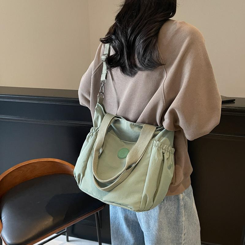 Large-capacity bag women's new spring and summer casual shoulder messenger bag texture class commuter tote bag