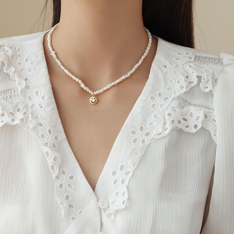 

Baroque Irregular Small Rice Pearl Necklace Light Luxury Niche Smiley Face Clavicle Chain Millet Bead Necklace