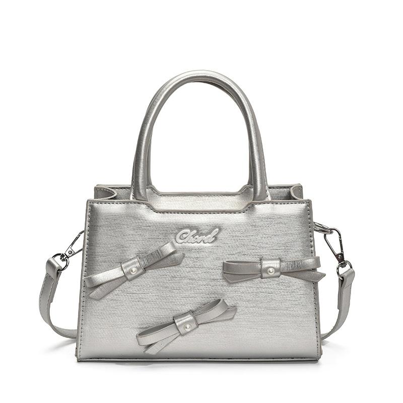 Korean version of bow small square bag women's 2025 summer new simple and fashionable handheld women's bag women's shoulder oblique span bag