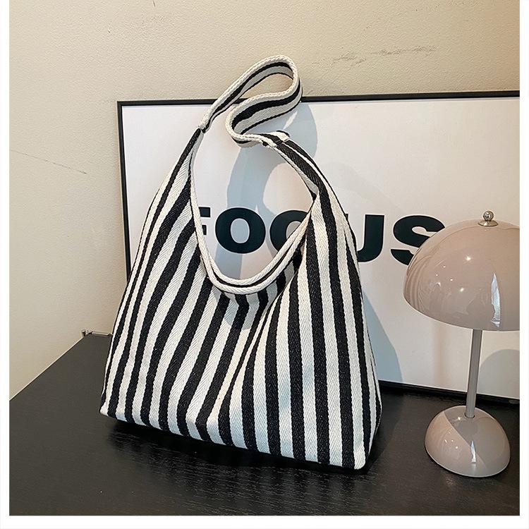 Small fresh striped handbag shoulder large capacity casual bag new women's bag messenger bag bucket bag