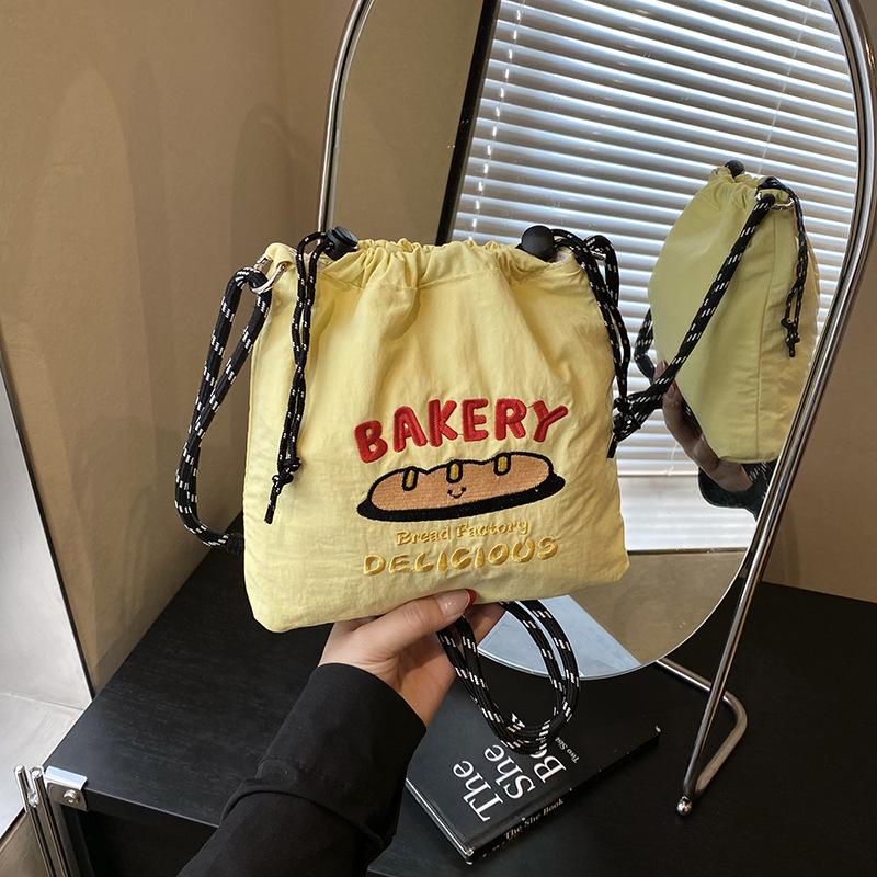 New nylon embroidered mobile phone bag fashionable versatile messenger bag simple drawstring canvas shoulder bag