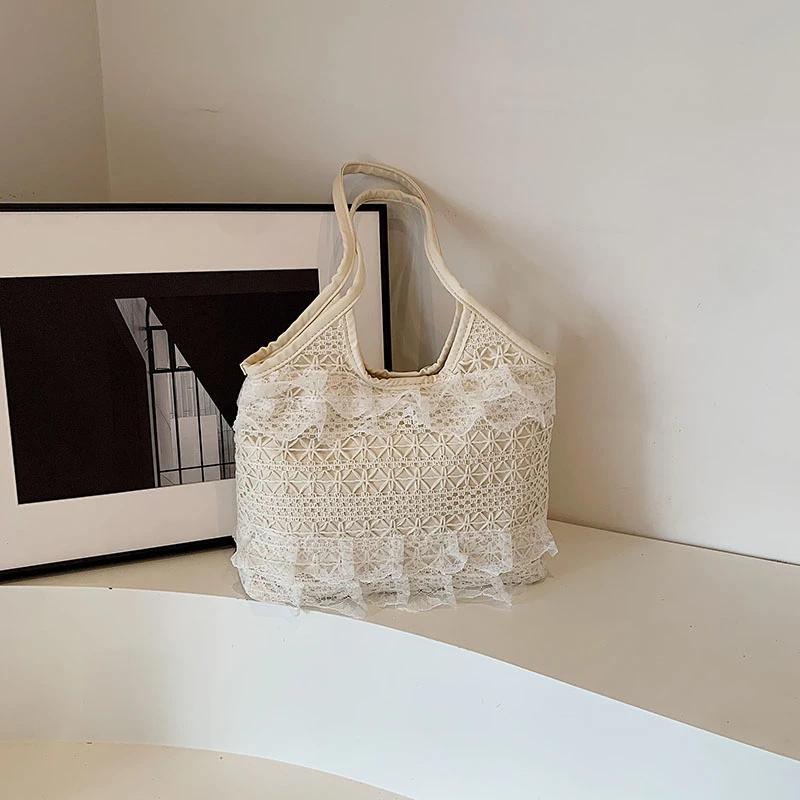 Bolso de mano para mujer con tejido de encaje calado estilo rústico de gran capacidad 2026 NUEVO Bolso de hombro ligero de estilo simple literario y artístico