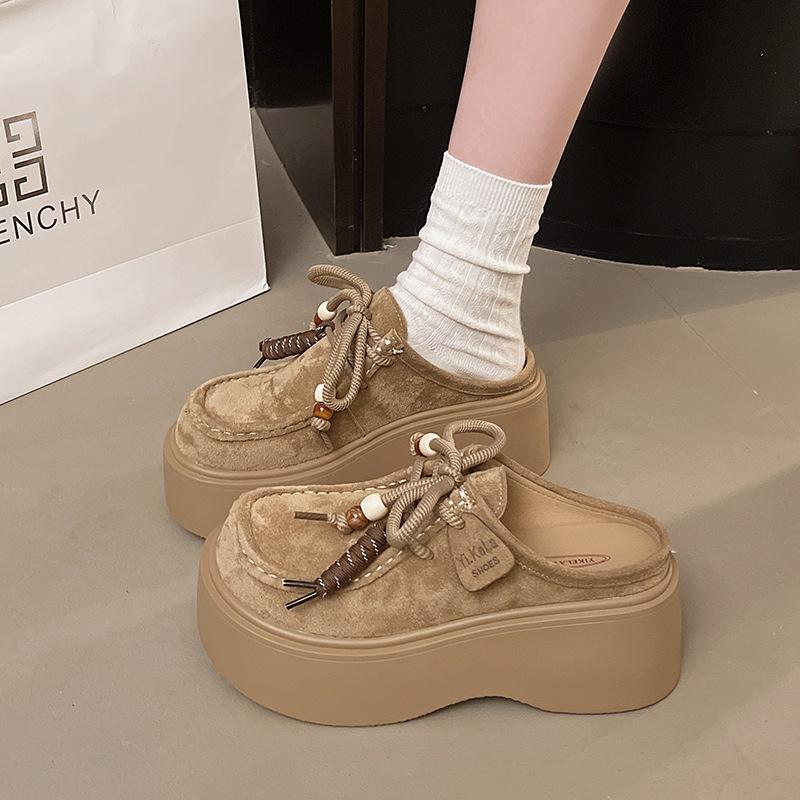 

Thick-soled Birkenstock slippers for women to wear in the autumn of 2025, the new muffin is not tired, and one pedal is a bag head and half slippers. 35 хаки