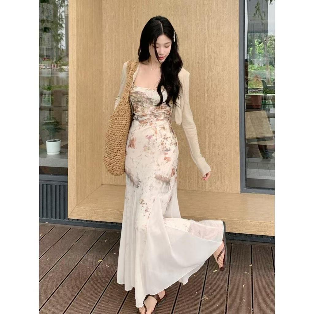Summer light luxury suspender dress women's spring waist and thin belly and hip long dress design sense national style floral skirt