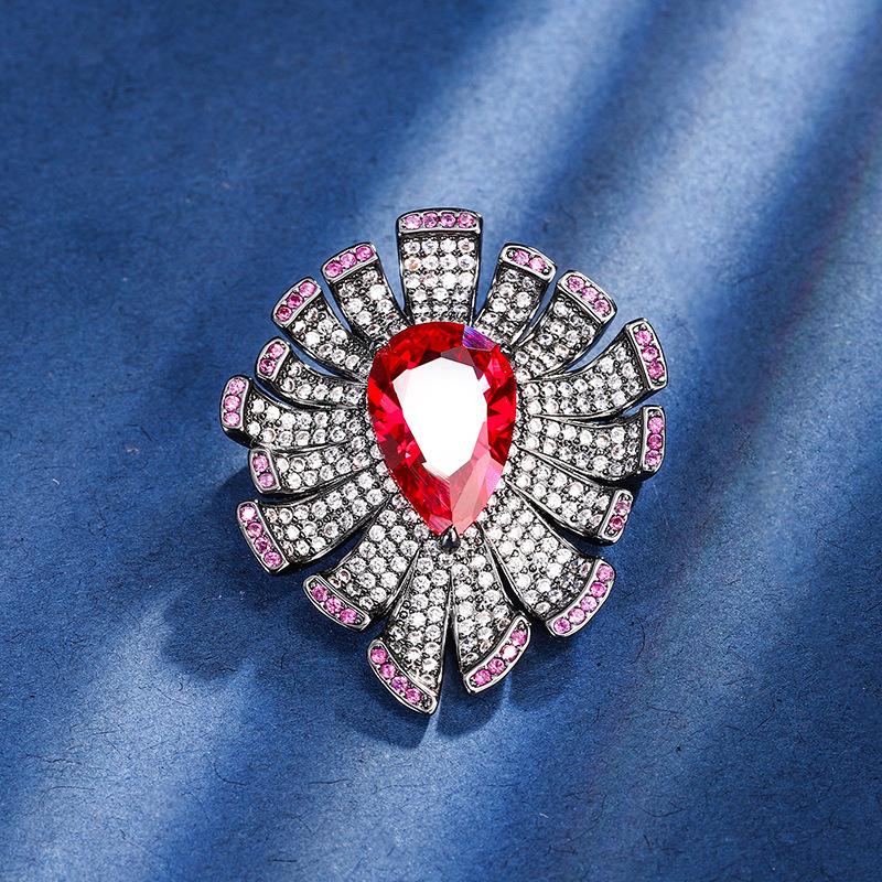 

Ювелирные изделия Медное основание Золотое покрытие Имитация Красный Ганг Капля воды Черное золото Индивидуальность 10 * 15