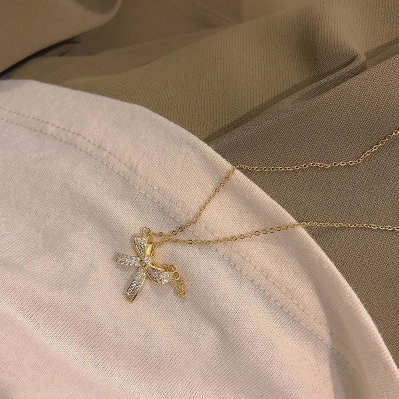 

Bow necklace women s light luxury niche design sense collarbone chain year new Internet celebrity is trendy neck chain temperament