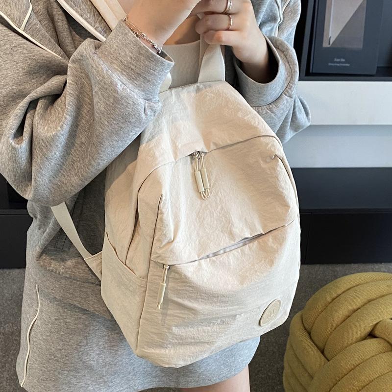 Large capacity bag new simple casual versatile backpack female college student schoolbag lightweight travel backpack