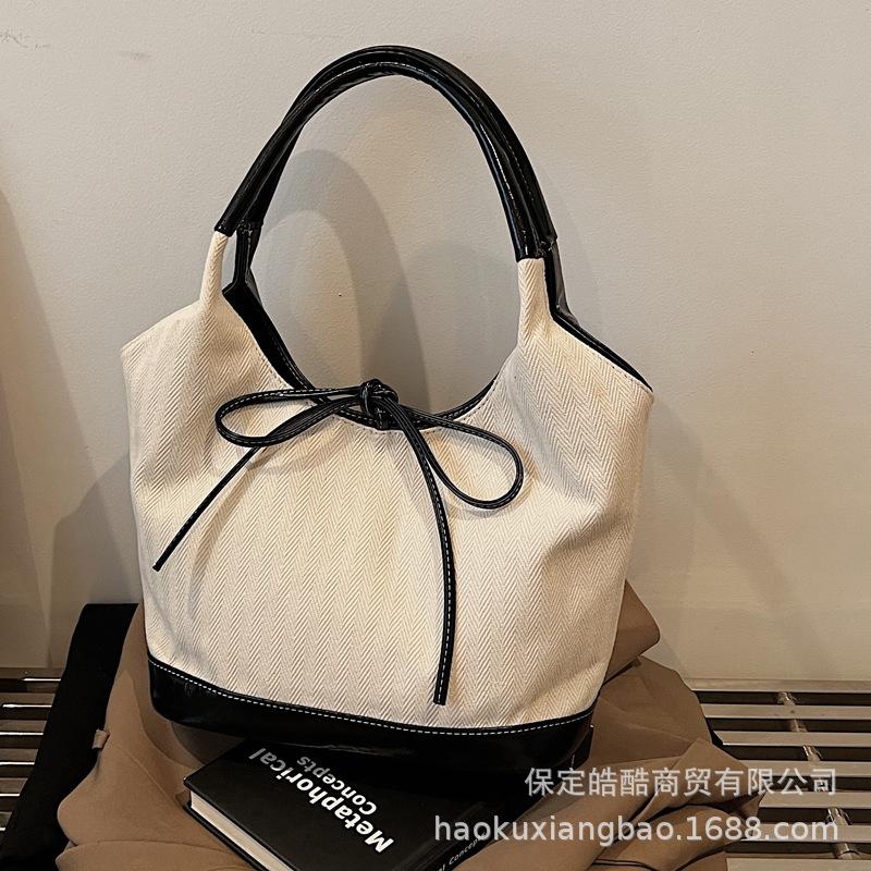 Hand carrying retro casual tote bag women's 2025 new Korean version trendy fashion polka dot underarm bag large capacity women's bag