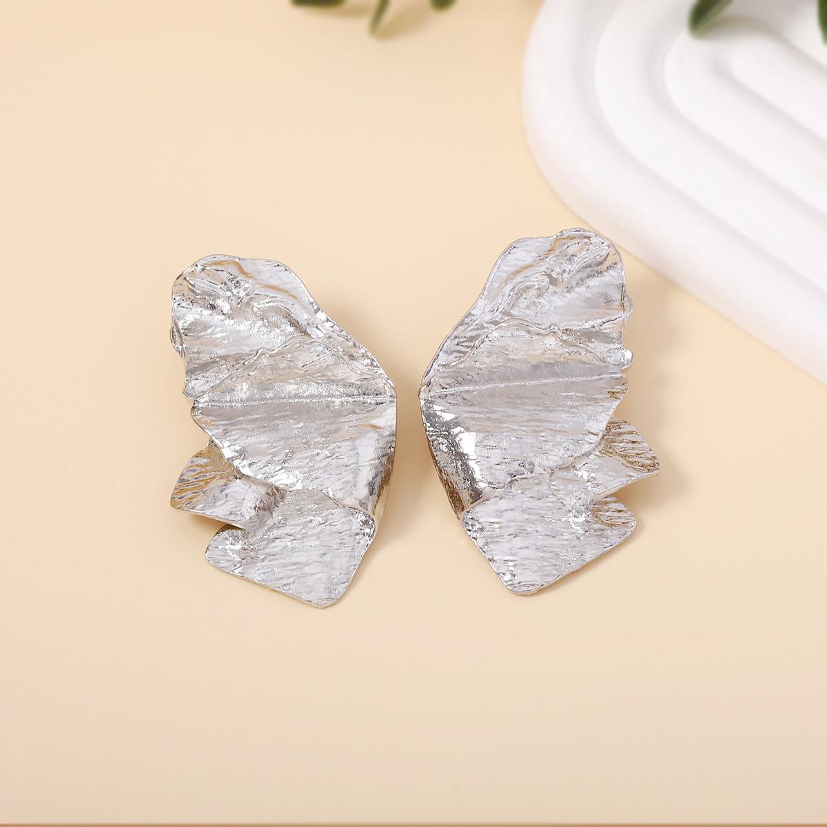 

New twisted pleated cold style irregular petal earrings with exaggerated high-end design and butterfly stud earrings