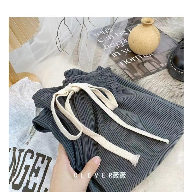 

Весенне-летние драпированные плиссированные брюки широкие штанины с узором змеиной кости высокая талия большая пластина прямые брюки-швабры женские average size 80-140 серый