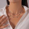 Light Luxury Stainless Steel Starburst Tassel Necklace: High-End Double Layer Clavicle Chain for Women's Fashion
