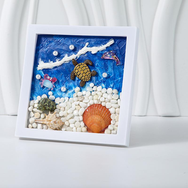 

Детский набор для изготовления фоторамки на морскую тематику с текстурированными камешками и ракушками для творческого рисования и поделок