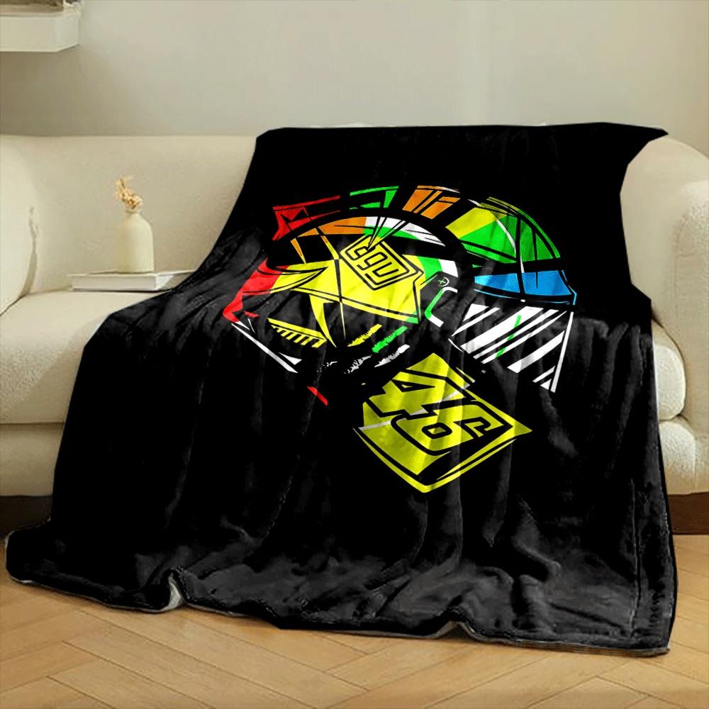 A colorful helmet design featuring bold geometric shapes and numbers. for all seasons blanket lunch break throw gift