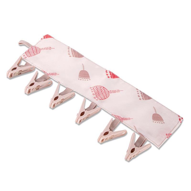 

Portable Foldable Clothes Hanger with Drying Clips for Travel, Hotel, Dormitory, and Business Trips.