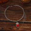 Collana con ciondolo a forma di cuore rosso ins europea e americana, design retrò, collana alta gamma con frange per la clavicola di Halloween