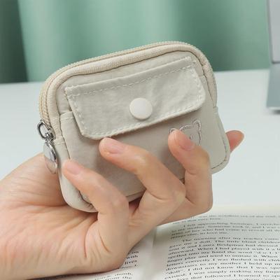 Borsa compatta per carte, auricolari e monete