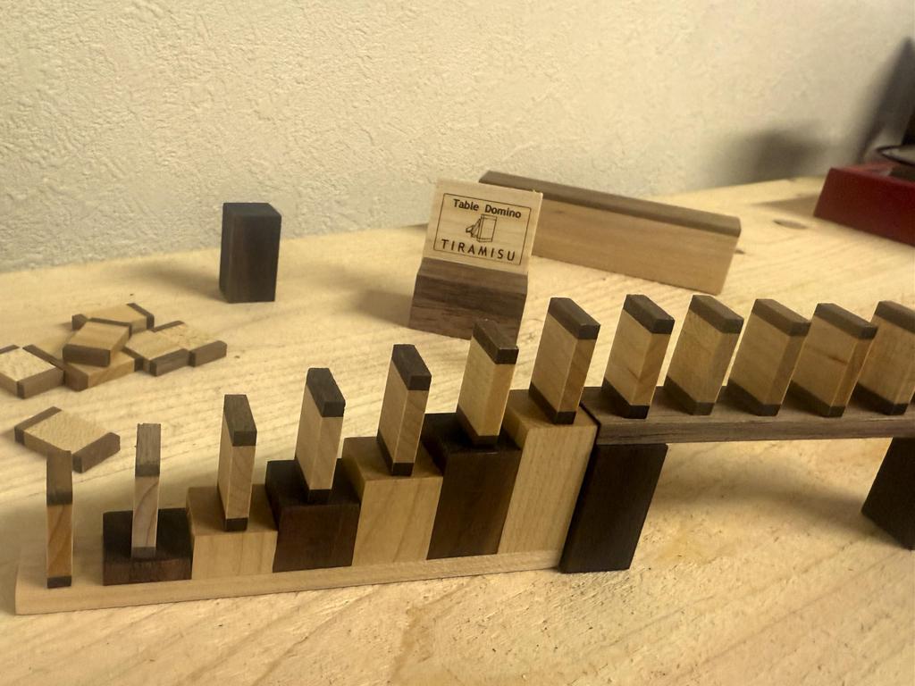 Stylish maple x walnut wooden domino set.
