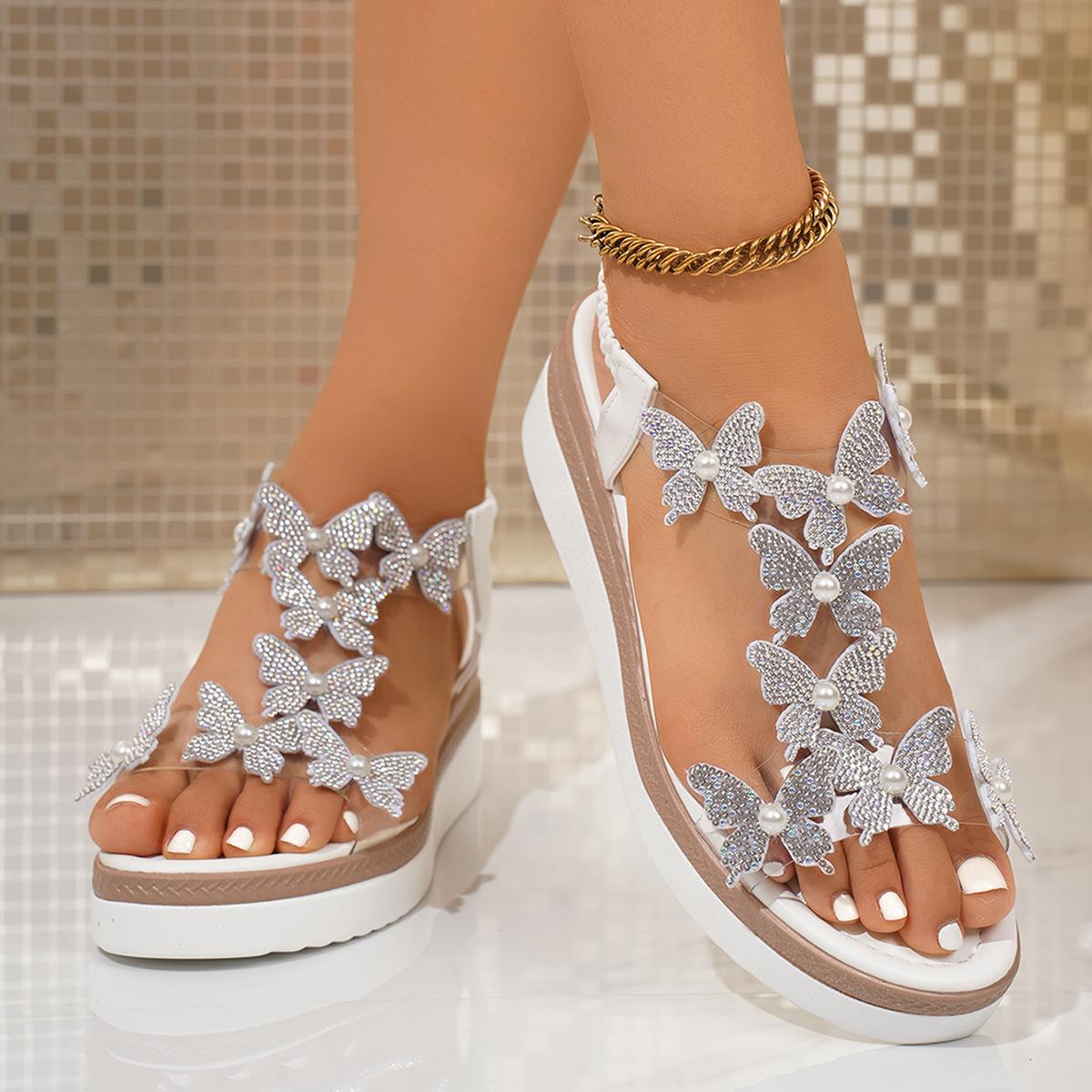 

Summer new foreign trade large size women s thick-soled wedge sandals European and American style butterfly decoration two-color sole 36