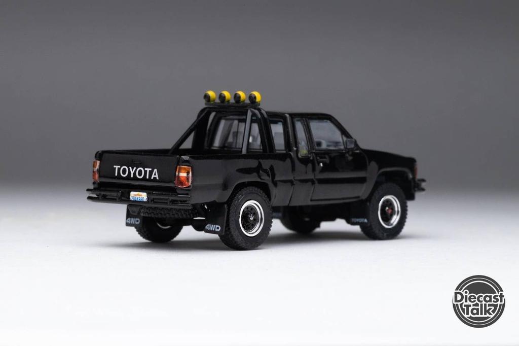 Gaincorp Products Diecasttalk x BoostGear Custom 1/64 Scale Toyota 1985 Hilux 4x4 SR5 Extra Cab Black (Finished)