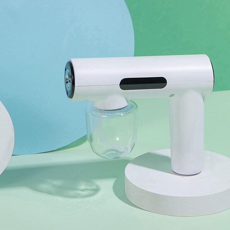 Tragbare Hand-Elektro-Befeuchtungssprühpistole Haushalts-Reisebedarf Zerstäubtes Blaues Licht Wiederaufladbare Desinfektionspistole