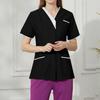 Tunic top da donna con scollo a V, maniche corte, bottoni sul davanti, tasche, finiture a contrasto, camicia uniforme da lavoro professionale