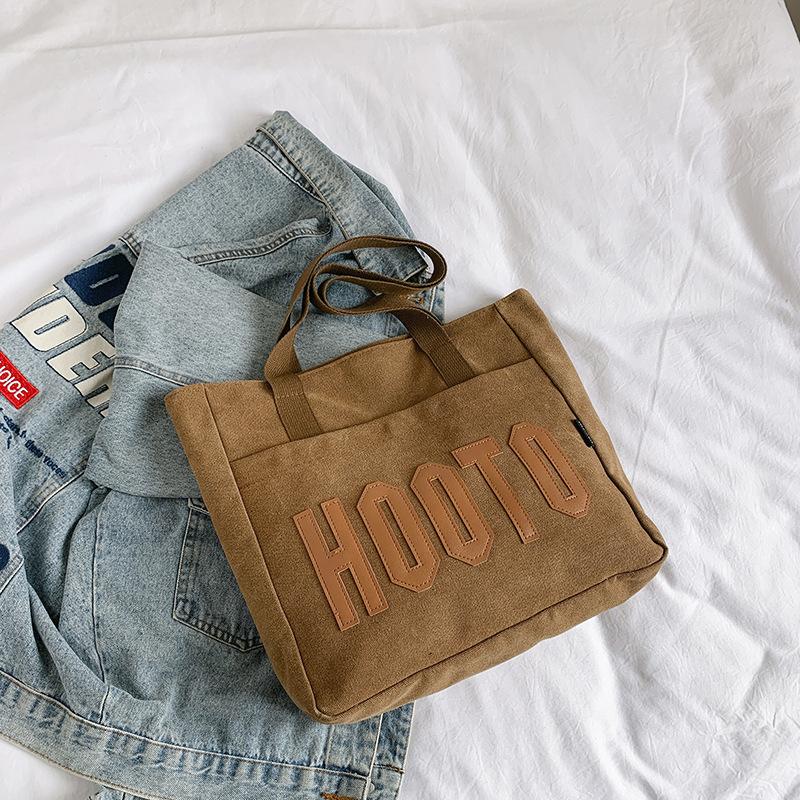 

In the spring of 2024, the new model will be commuting to work, large-capacity class, commuting tote bag, portable shoulder crossbody armpit bag. коричневий