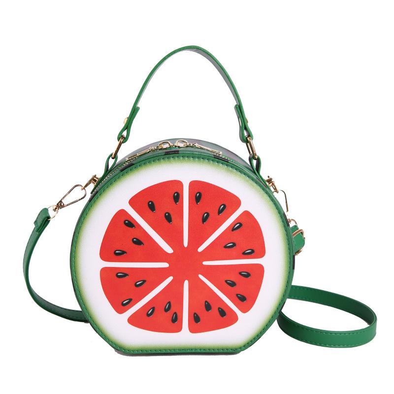 A Girl Carrying An Unconventional-shaped Bag Over Her Shoulder for Daily Commuting Purposes.