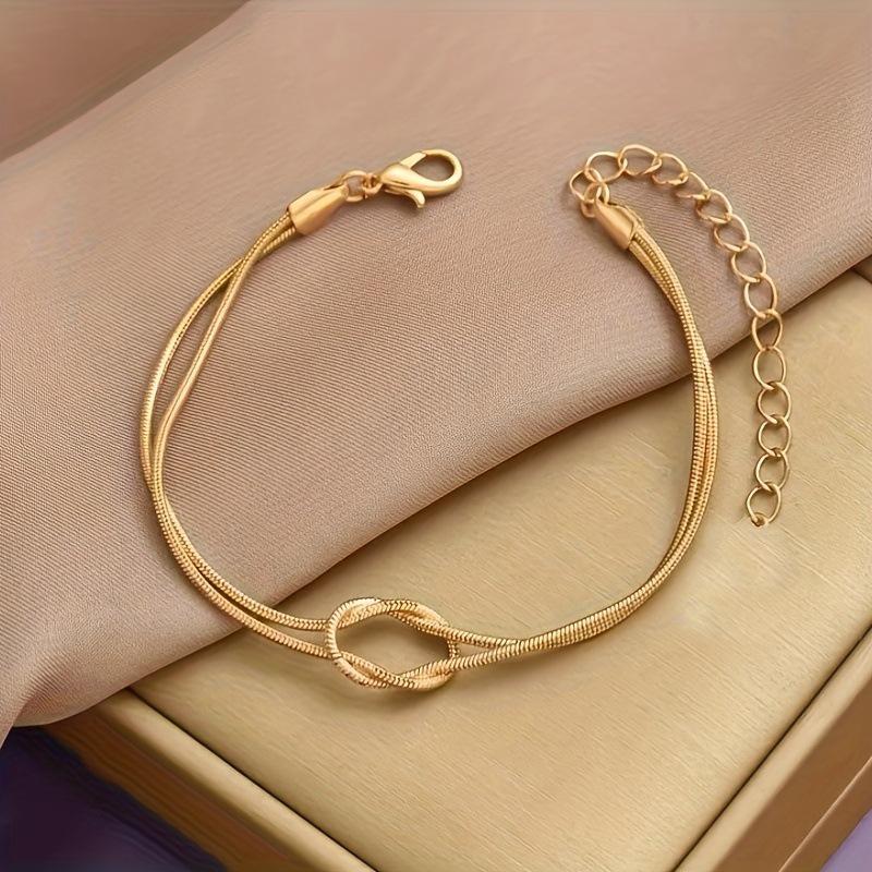 

European and American Luxury Minimalist Snake Bone Double-Layer Knotted Bracelet золотий