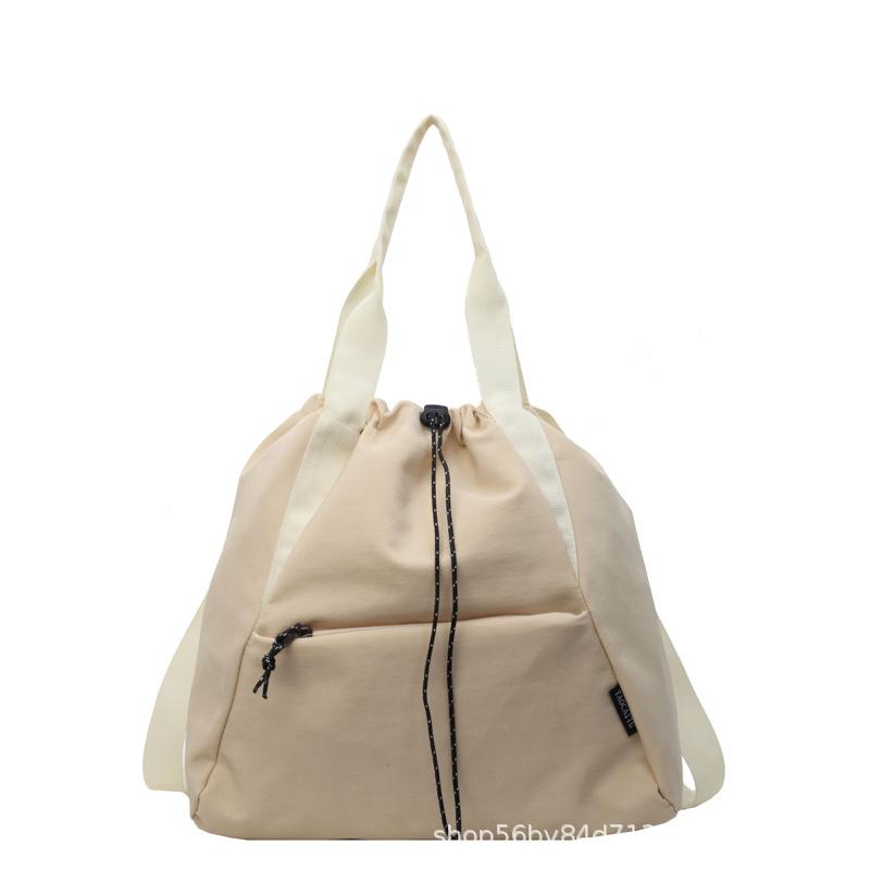 Fashion and leisure large-capacity tote bag women's 2025 spring portable versatile canvas bag multi-pocket shoulder bag