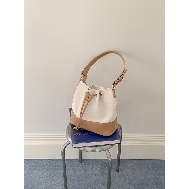 

Canvas bag lazy style literary niche design shoulder bag splicing drawstring folds new bucket bag women абрикосовый