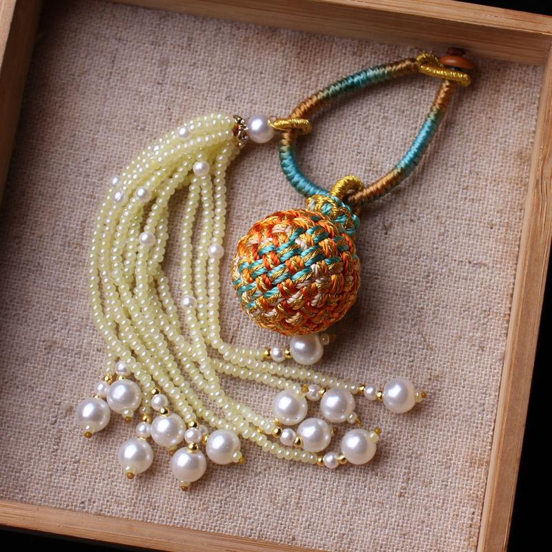 Number 16 Handmade Tassel Accessory with Ball Charm, Pearl, and Spinel Details.