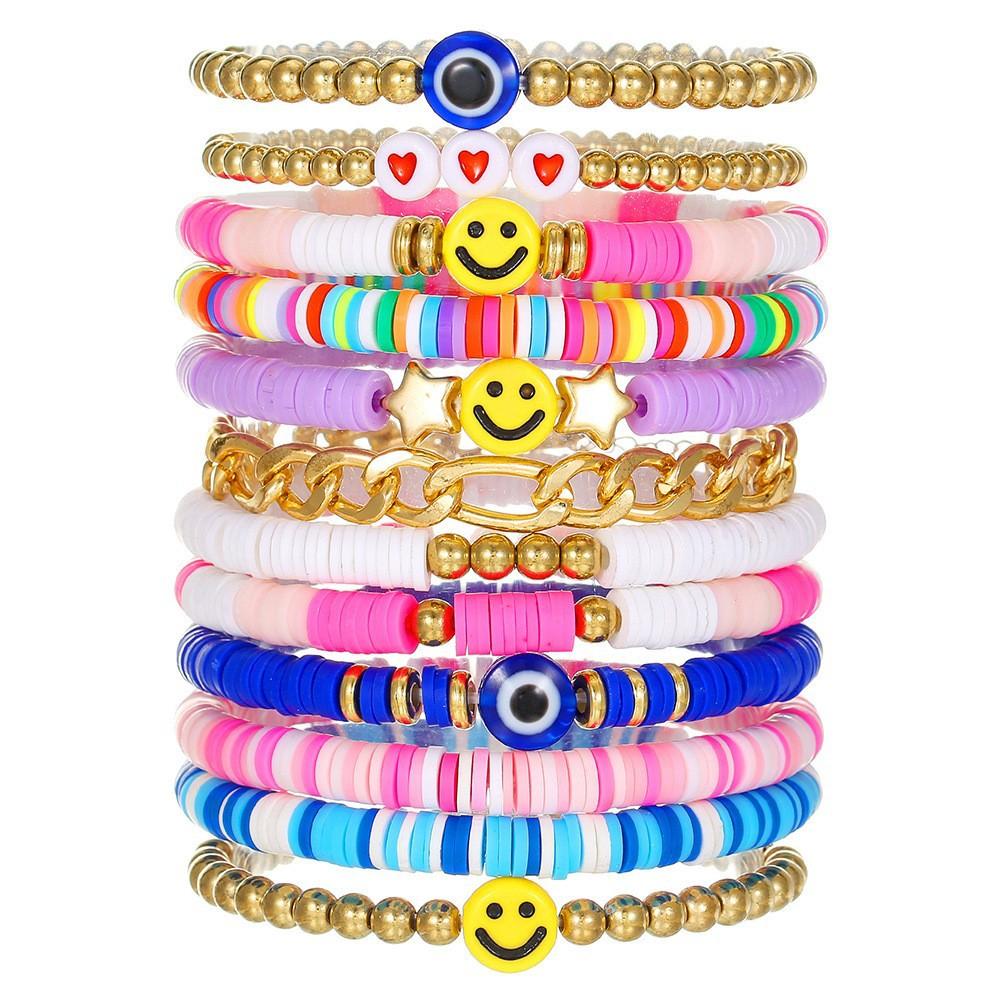 Korean version of fashion new multi-layer elastic thread soft pottery love smiley face bracelet set retro handmade pearl jewelry women