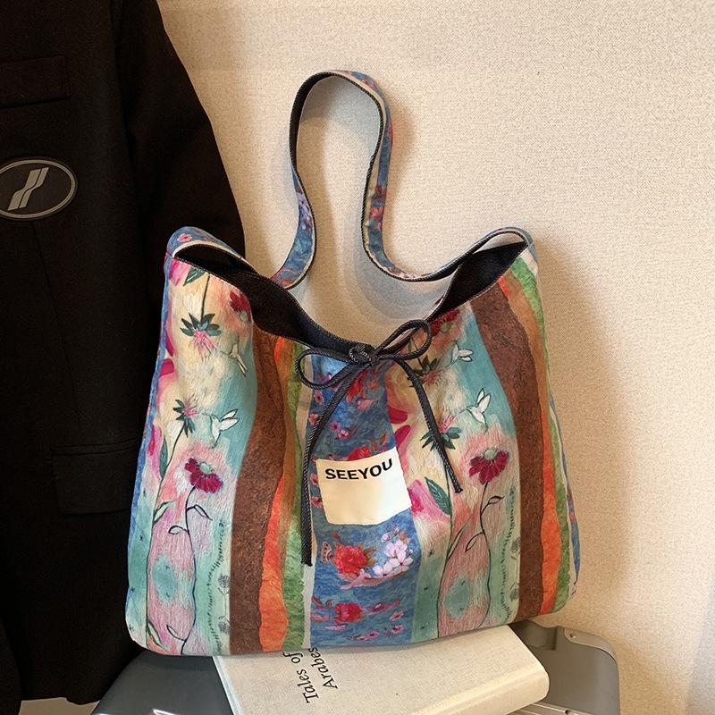 2025 spring and summer new color printed canvas bag denim double-sided messenger bag versatile commuter tote bag