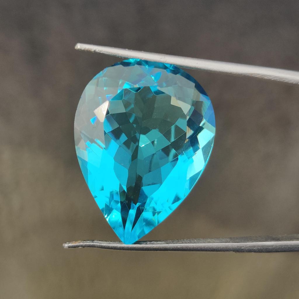 Pear Cut Sky Blue Topaz Shade Glass Stone, 21.95 Carat, 24x18x10 MM Size Pear Shape Stone.