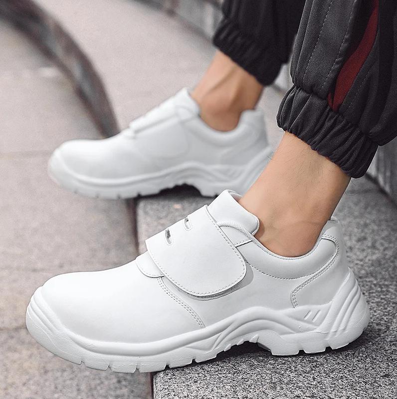 Herrenmode Stahlkappen Arbeitssicherheitsschuhe Weiches Leder Sicherheitsstiefel Schwarz Weiß Arbeiter Sichere Sneaker Schutzschuhe