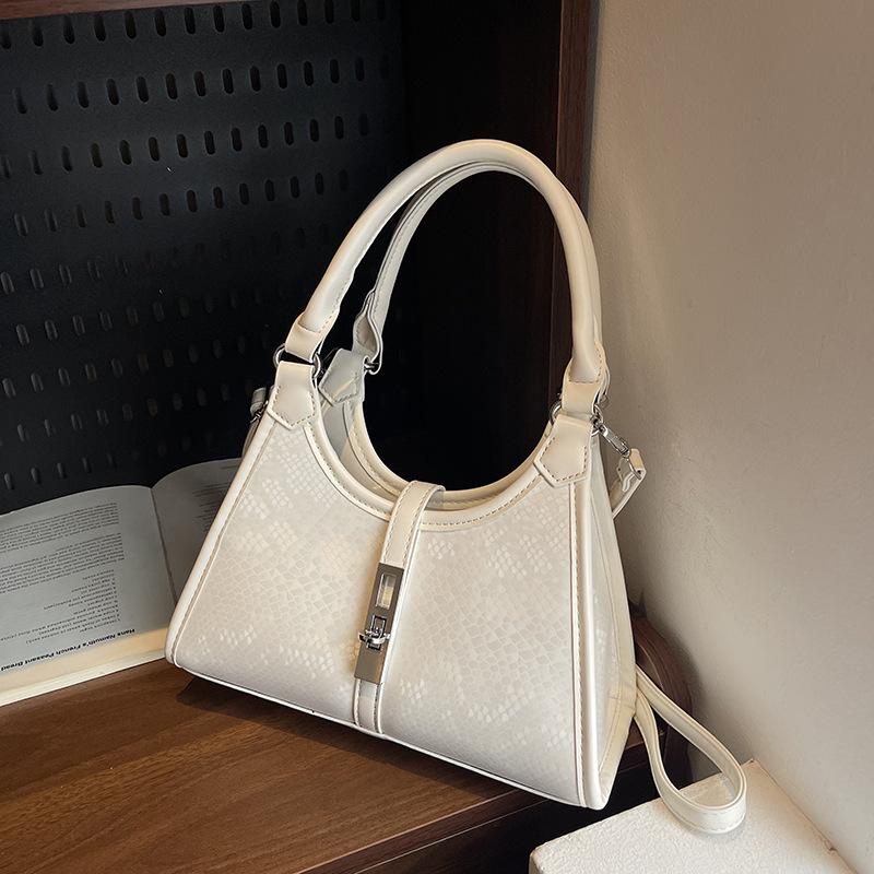 Simple retro shoulder bag women's new daily commuting niche design portable underarm messenger bag