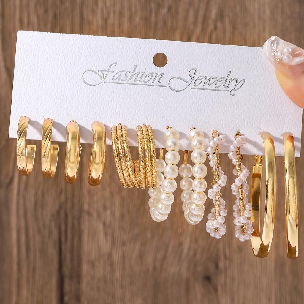 European and American new earrings set 1 pair of golden metal twist pearls creative retro simple and versatile earrings
