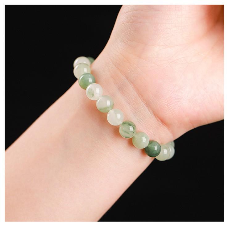 Women's Natural Tianshan Green Jade Bracelet with Round Beads and Floating Flower Design